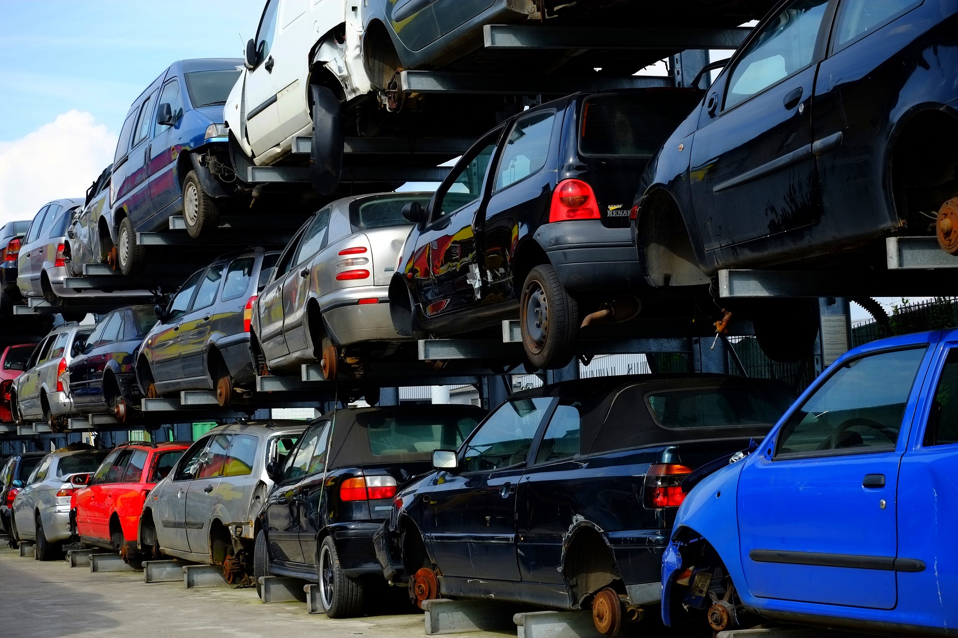 cars stacked in a scrapyard